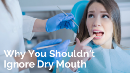 Woman at the dentist pointing at her mouth with a concerned look and the words, Why You Shouldn't Ignore Dry Mouth.