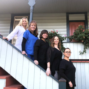 Dr. Dooley and her staff on the steps of her Placerville dental office
